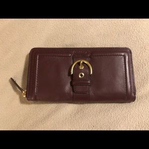Lightly used coach wallet burgundy color